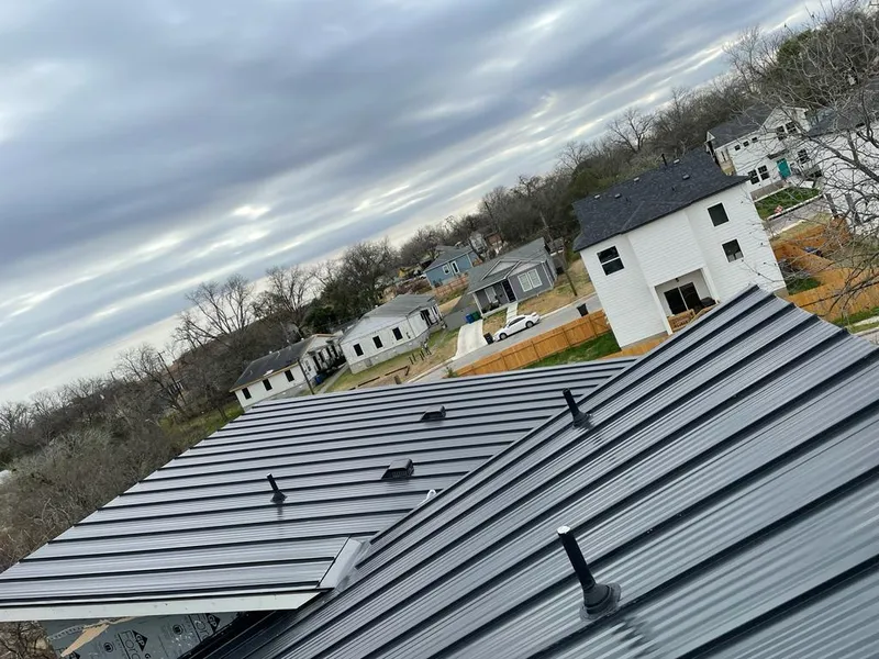 Standing seam metal roof panels with vents for Skylight Repair in Crookston